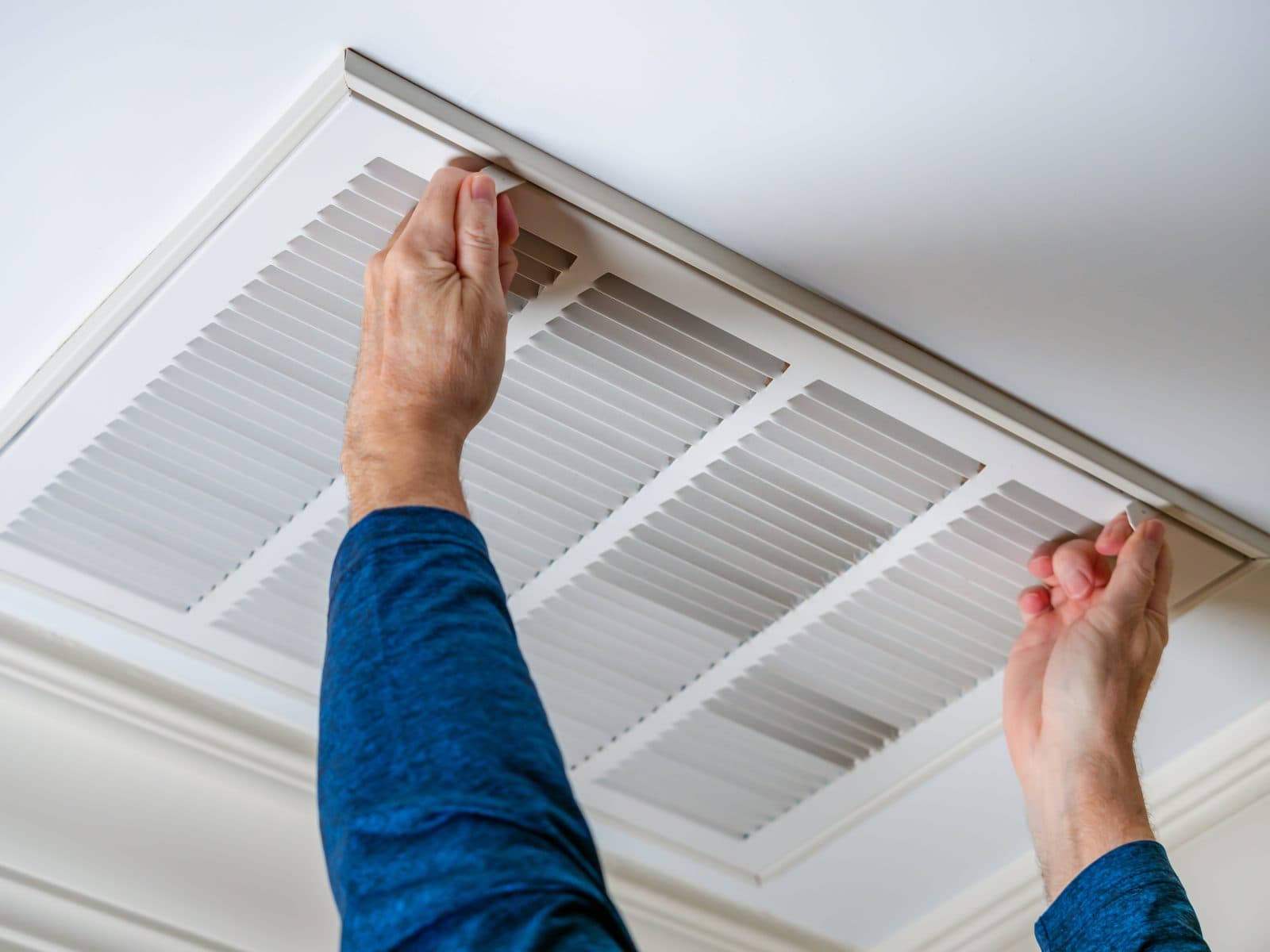Crawl space vent covers installed on foundation vents to help reduce moisture and pest entry
